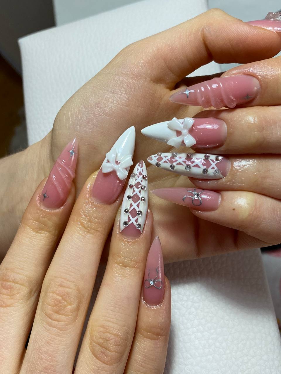 Pink stiletto nails with rhinestones